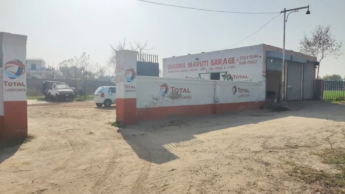Sharma Maruti Garage frontage with signage and Total Lubricants branding
